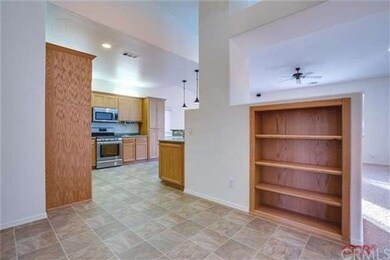 Nook area, with built-in shelves.  Could be used a