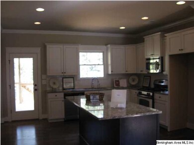 Look at this kitchen! Granite counters, stainless 