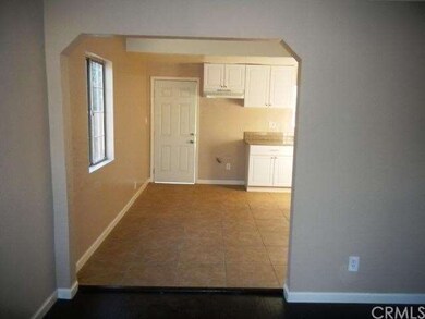 Dining area and kitchen view from living room.