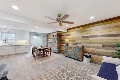 Dining room featuring ceiling fan, recessed lighti