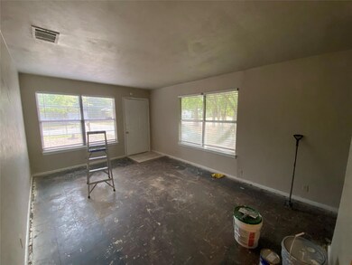 Living Room **Home interior and exterior under construction. New floors, paint, fixtures and appliances to come.**