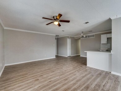 Unfurnished living room with light wood finished f