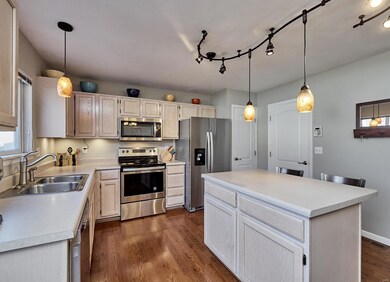 The bright kitchen boasts great counter/prep space