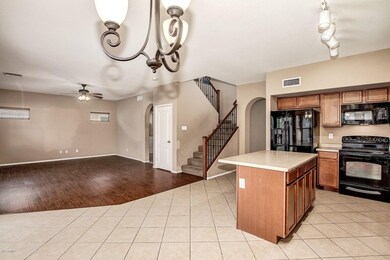Kitchen opens to living room