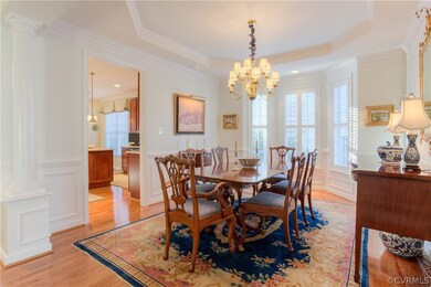 Dining Room Hardwood with chandelier