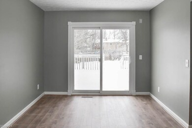 Formal dining room with a sliding door to the back