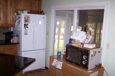 Kitchen door to enclosed 11x17 patio