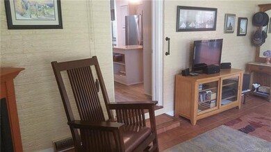 Enter through the sunroom to the remodeled kitchen