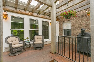 Start your day here with a cup of coffee as the sun rises.  This deck faces east, so you get the perfect morning sun.  Then in the afternoon it is shaded. Copper lanterns and wrought iron railing add to the beauty of the Brazilian hardwood deck. 