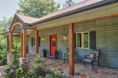 Stone floor, timbers and lovely plantings make thi