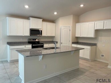 56 Oakleaf Way, Palm Coast, FL 32137 - photo 4