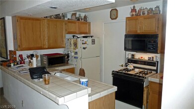 KITCHEN DOOR LEADS TO LAUNDRY/PANTRY