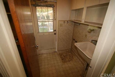 LAUNDRY OFF OF KITCHEN