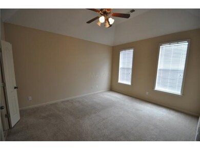 Very nice sized Master Bedroom with ceiling fan an