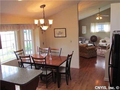 Kitchen Dining. Gleaming hardwoods throughout this