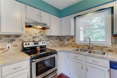 Kitchen with great view of the backyard
