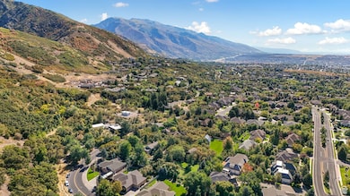 Aerial view of residential area featuring mountains