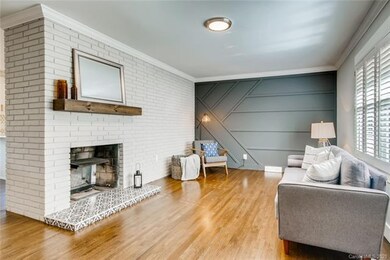 Living room refinished original hardwoods, firepla