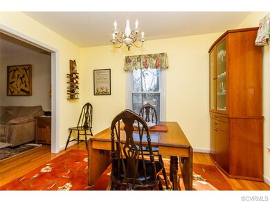 DINING ROOM W/ HARDWOOD FLOORS