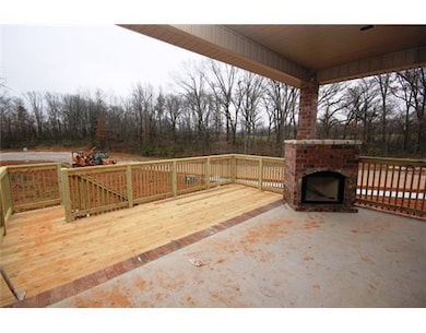 Patio/Deck. Large covered patio & deck with outdoor fireplace!