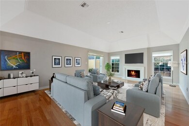 Virtually staged. LIVING ROOM with CLASSIC FIREPLA
