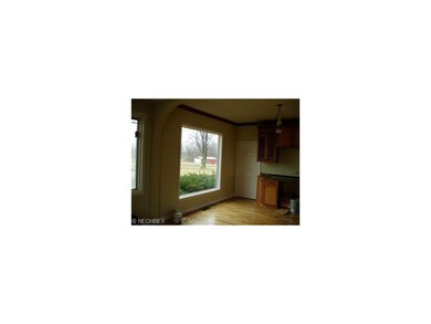 Eating area of spacious kitchen.  More upper cabin