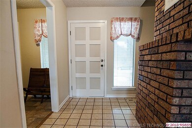 The tiled entry is light and bright