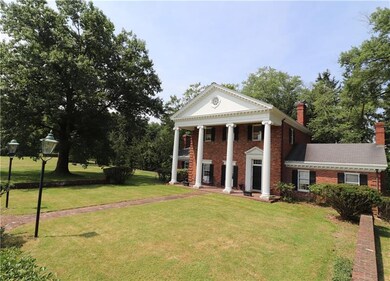 Guests arrive on a stately Governors Drive, traver