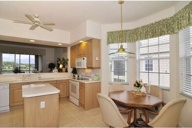 Another angle of kitchen showing breakfast nook wi