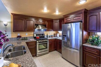 Handsome cabinets and plenty of counter space for 