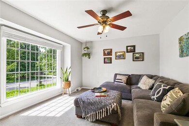 Step into a bright & sunny Formal Living Room.