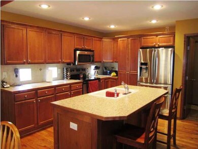 Great kitchen with eating island, lots of cabinets