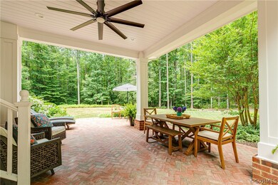 View of patio with ceiling fan