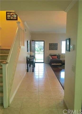 looking back at the front entrance from kitchen ar