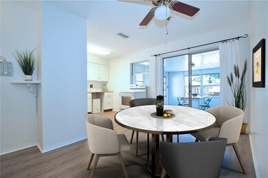 Dining Area to Kitchen and Florida Room