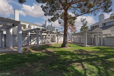 View of yard with a pergola
