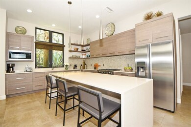 Quartz waterfall bar in the kitchen