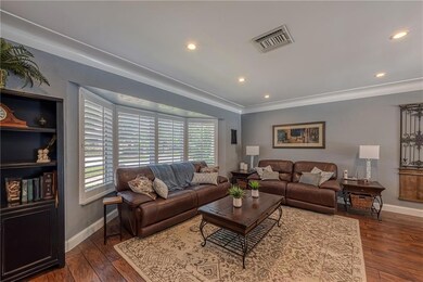 Crown molding and hi-hat lighting in family room