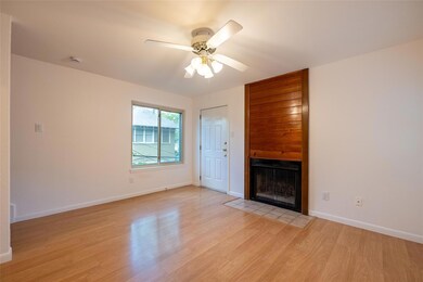 Unfurnished living room featuring light wood-styl
