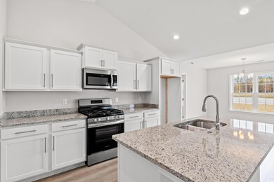 Kitchen with a sink, appliances with stainless ste