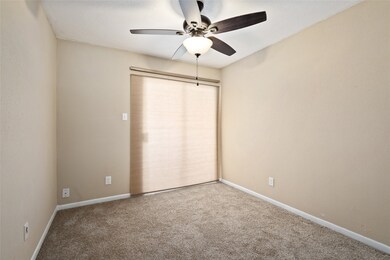 bedroom #2. both bedrooms has access to the patio