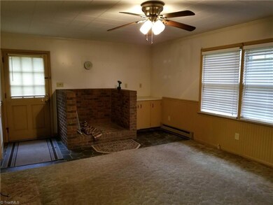 Den with Area for Wood Stove