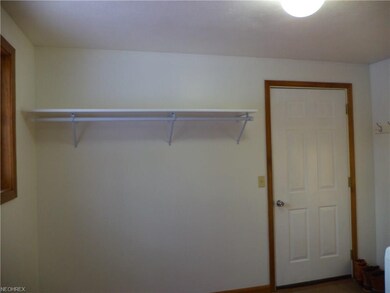 Large laundry/mud room with a lot of natural light