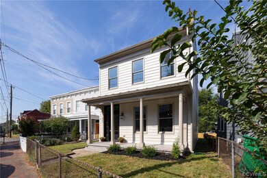 View of front of home featuring a porch and a fron
