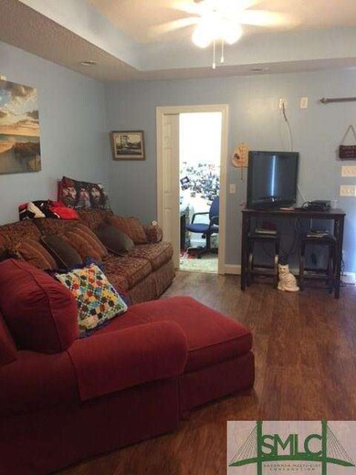 Master bedroom sitting area with office
