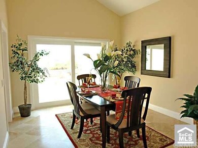 Elegant Formal Dining Room with Slider to Backyard