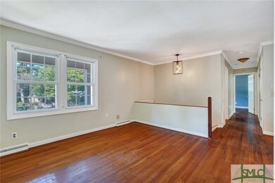 The living room offers an abundance of natural lig