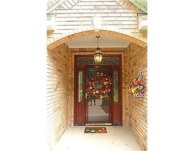 Exterior Front. What an entry way!