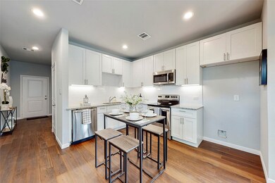 White cabinets with granite countertops