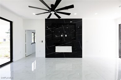 Empty room featuring baseboards, recessed lighting